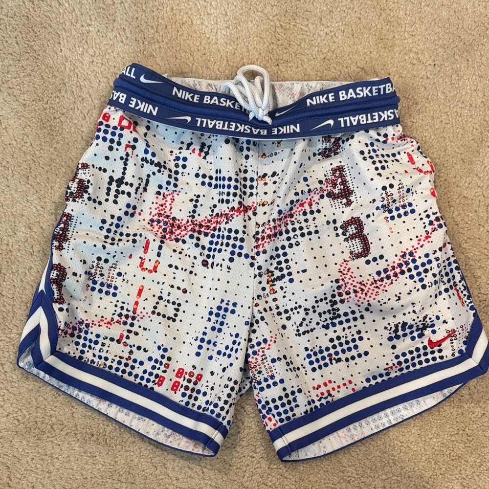 Nike Men's White Athletic Shorts with Blue and Red Print